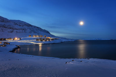 Full moon at residential area in nuuk greenland