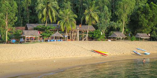 Calm sea with buildings in background