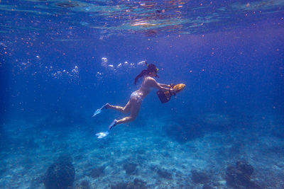 Man swimming in sea