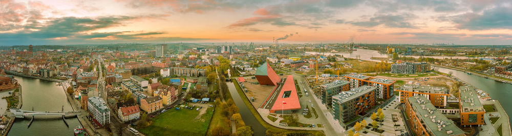 High angle view of buildings against sky during sunset