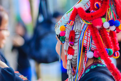 Close-up of woman wearing colorful traditional clothing
