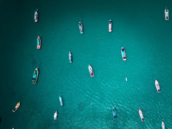 Aerial view of boats moored on sea