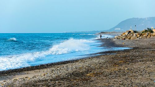 Scenic view of sea against clear sky