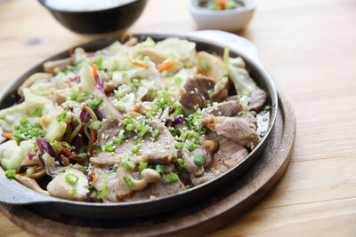 High angle view of salad in bowl on table