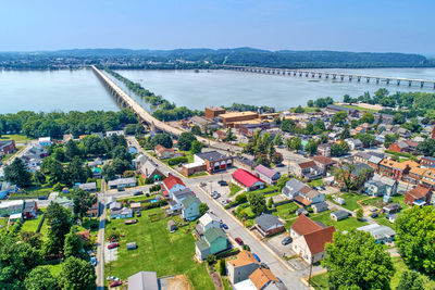 High angle view of river amidst buildings in city