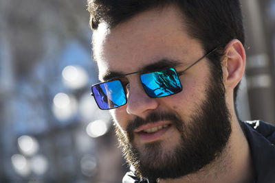 Close-up of handsome man looking away