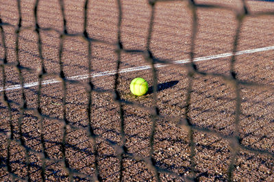 High angle view of tennis ball on tennis court