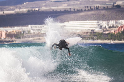 Man surfing in sea