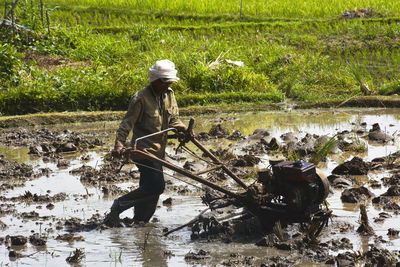Man working in river