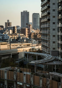 Buildings in city against sky