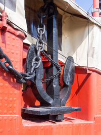 Close-up of chain hanging on metal