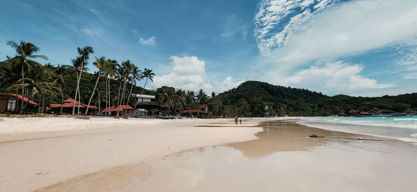 Scenic view of beach against sky