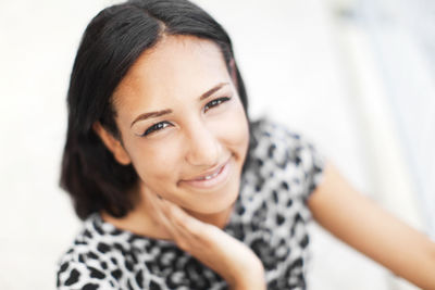 Portrait of smiling young woman, new york city, usa