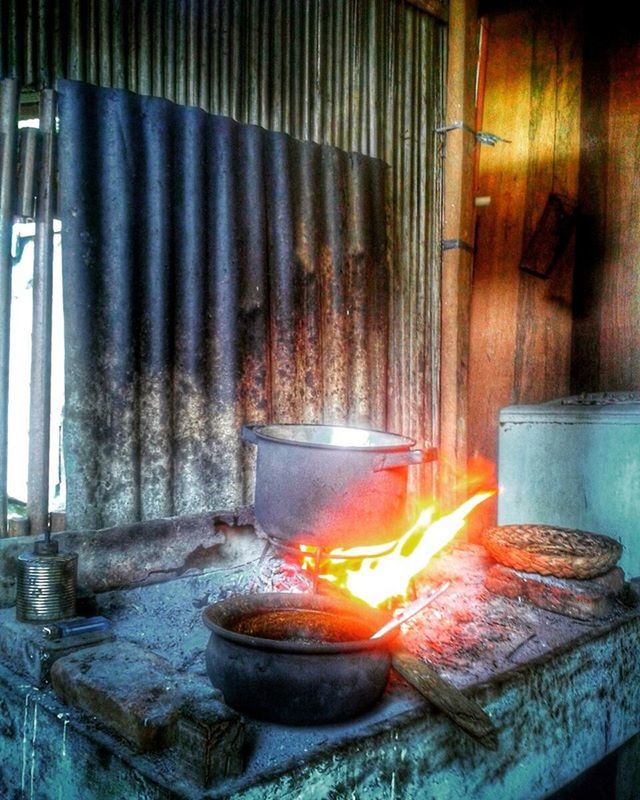 heat - temperature, flame, burning, fire - natural phenomenon, indoors, food and drink, cooking, wood - material, preparation, food, close-up, still life, glowing, fire, candle, no people, preparing food, freshness, table, container