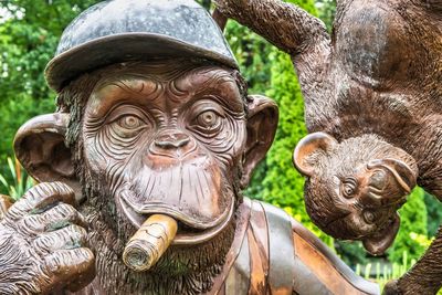 Close-up of statue against plants