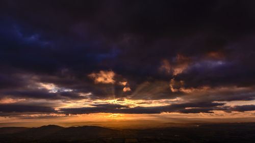 Storm clouds over landscape
