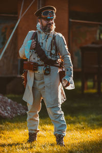 Full length of man standing on field