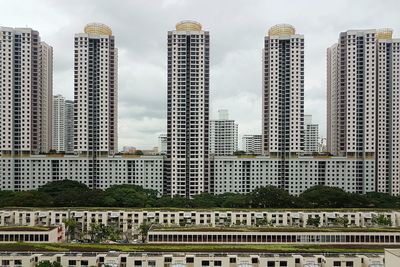 Modern cityscape against sky