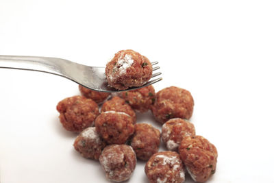 Close-up of breakfast against white background