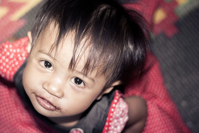 High angle portrait of cute girl at home