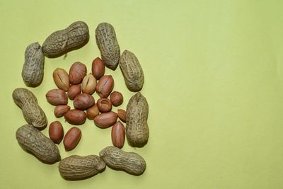 Directly above shot of various fruits on white background