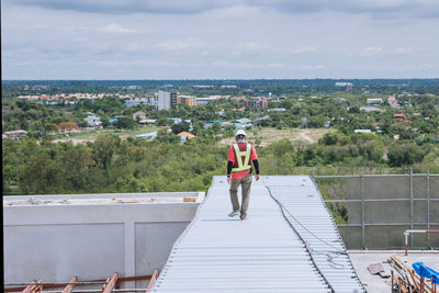 Project engineer, engineer and technician working on construction site, 