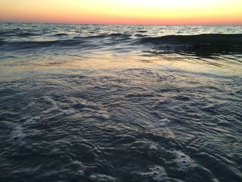 Scenic view of sea at sunset