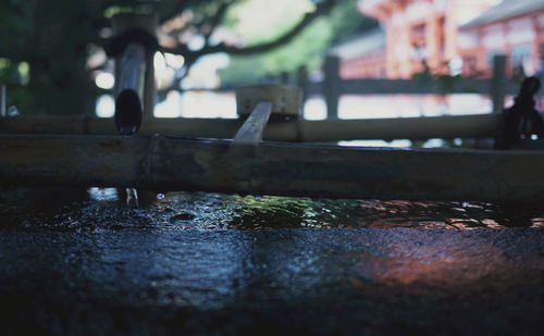 Close-up of wet wall in city