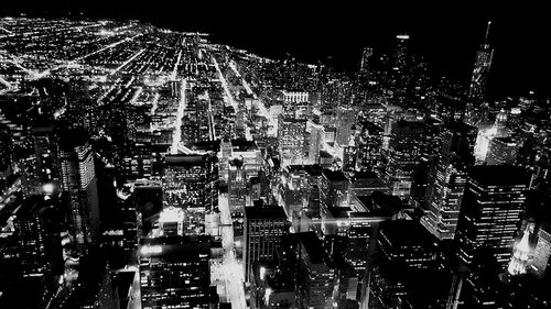 Illuminated cityscape at night