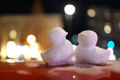 Close-up of illuminated christmas lights on table