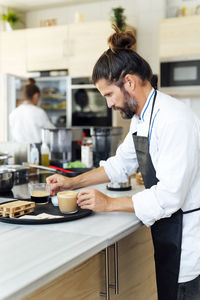 Man and coffee at cafe