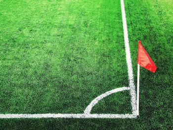 High angle view of flag on grass