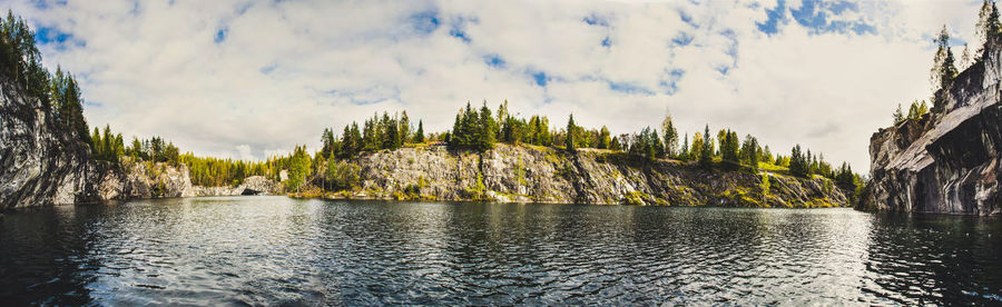 Panoramic view of trees against sky