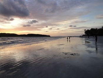 Scenic view of sea at sunset