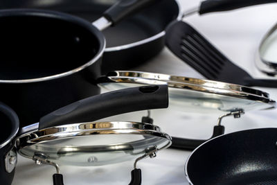 Close-up of kitchen utensils on table