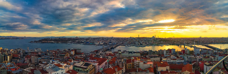 High angle view of city at sunset