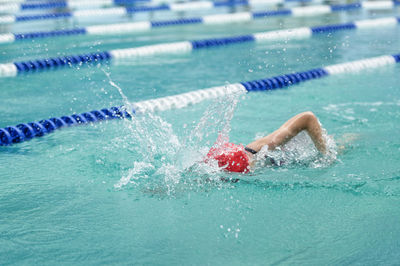 Girl swimming in pool