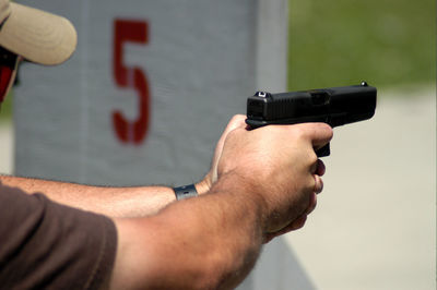 Man aiming with gun