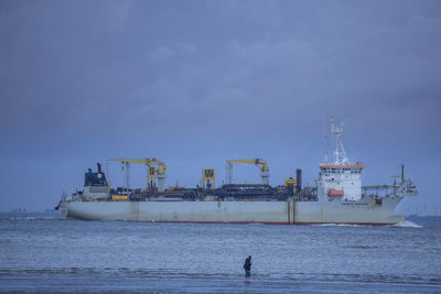 Ship in sea against sky