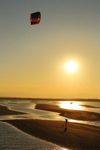 Kitesurfing and sunset