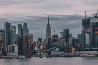 Modern buildings in city against sky