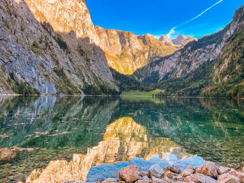 Scenic view of lake and mountains against sky in obersee germany 