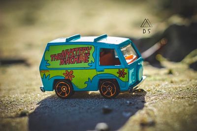 Close-up of toy car on field