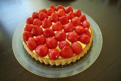 High angle view of strawberries in plate on table