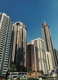 Low angle view of modern buildings against clear sky