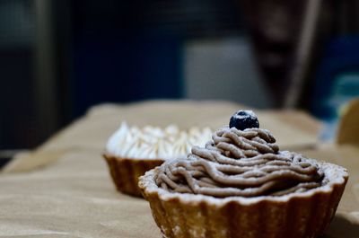 Close-up of cupcake on table