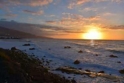 Scenic view of sea against sky during sunset