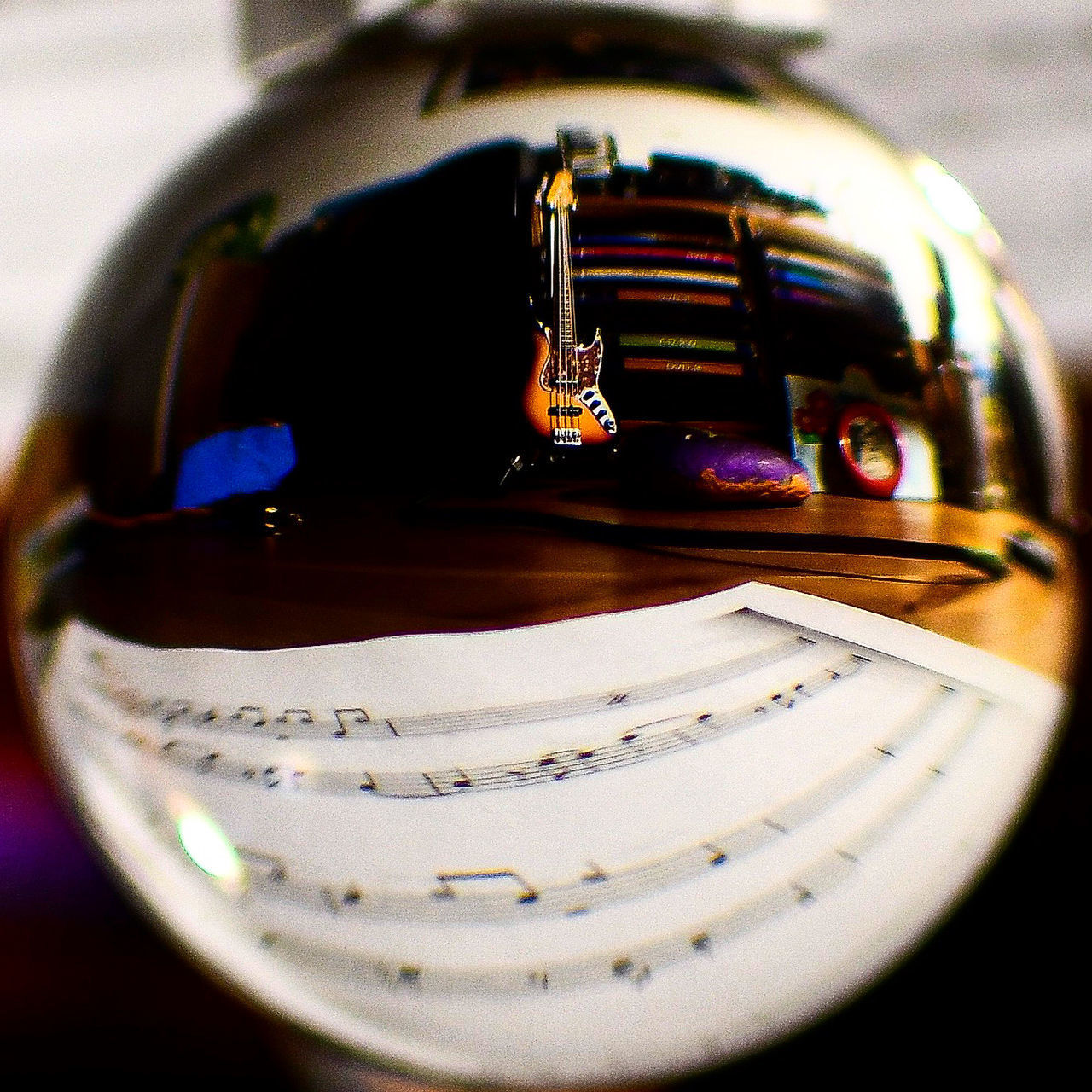 CLOSE-UP OF GLASS OF WINE ON TABLE