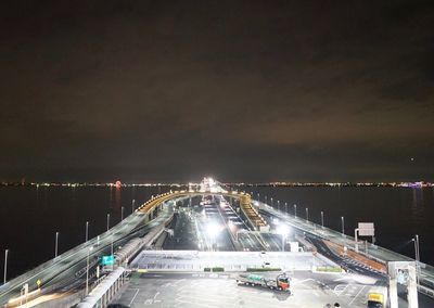 High angle view of light trails on highway at night