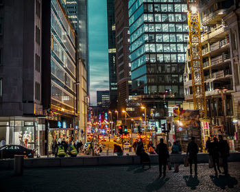 People walking on city street